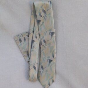Stacy Adam's neck tie, yellow mingled wit green leaves